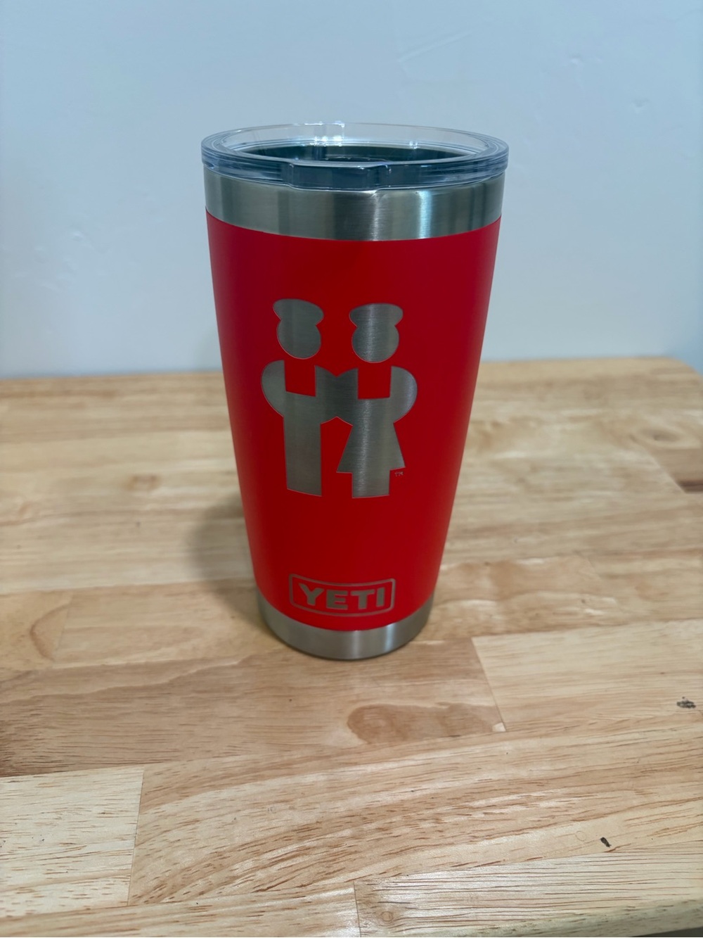 Yeti Red Tumbler with Silver Couple Logo